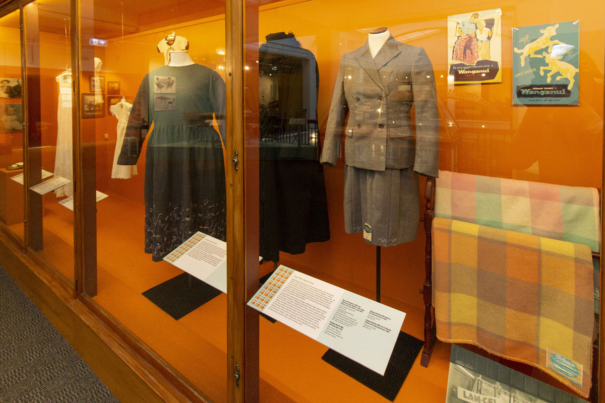 Whanganui Mūmū - Whanganui by Design glass cases with objects and labels.