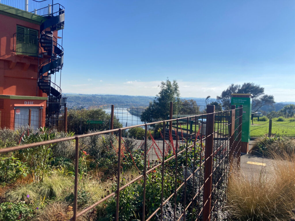 The Mantles, Dalgleish Architects award winning home, with copper fencing and view of the Durie Hill Elevator and Whanganui River. 